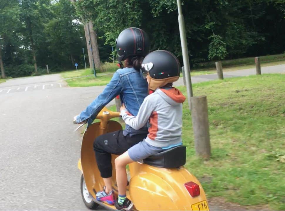 taking a small passenger along on a classic vespa V50
